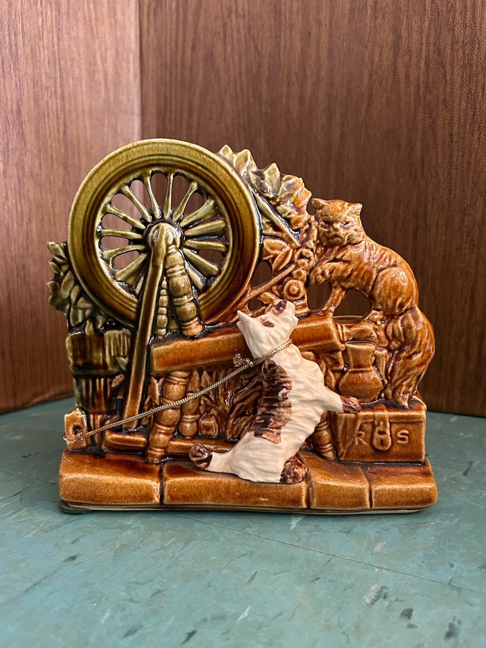Vintage McCoy pottery planter cat and dog on spinning wheel